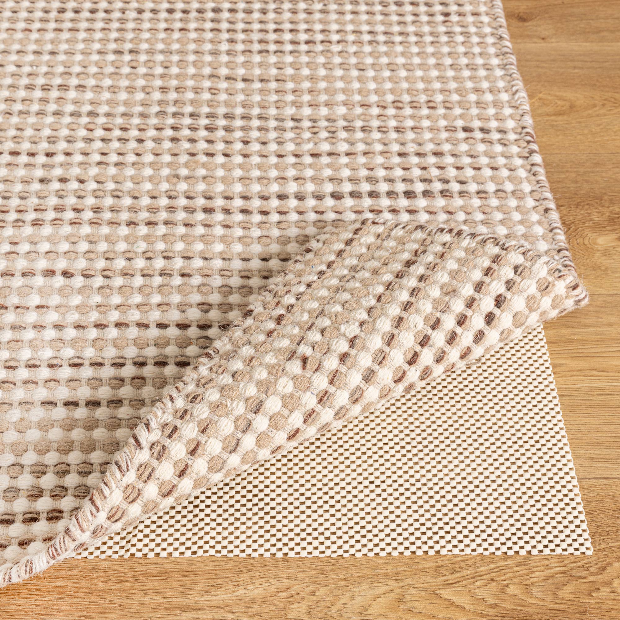 Anti - Slip White RUG STOP pad for hard surfaces, Wooden & Tiled - Rug Pad - Rugs a Million